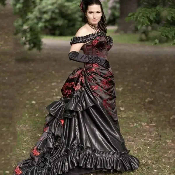 Gothic wedding dresses: Black and red Victorian bustle bridal gown