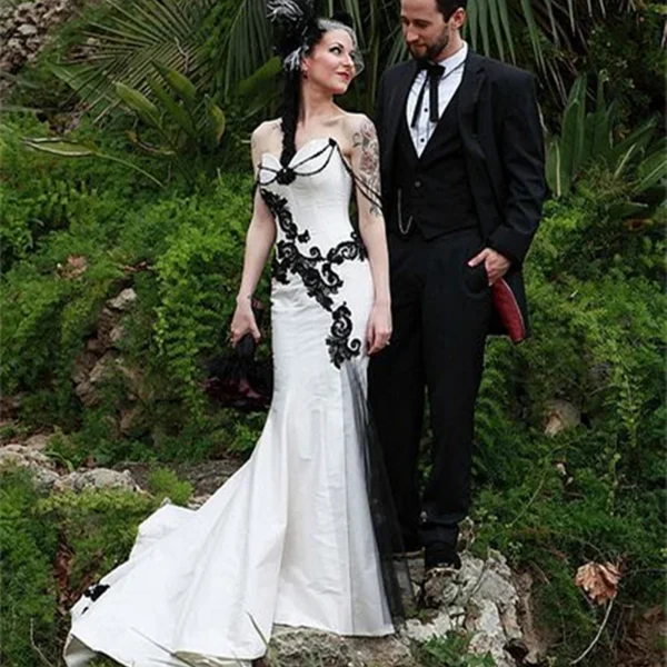 Gothic wedding dresses: Black and white satin, off-shoulder, beaded corset gown